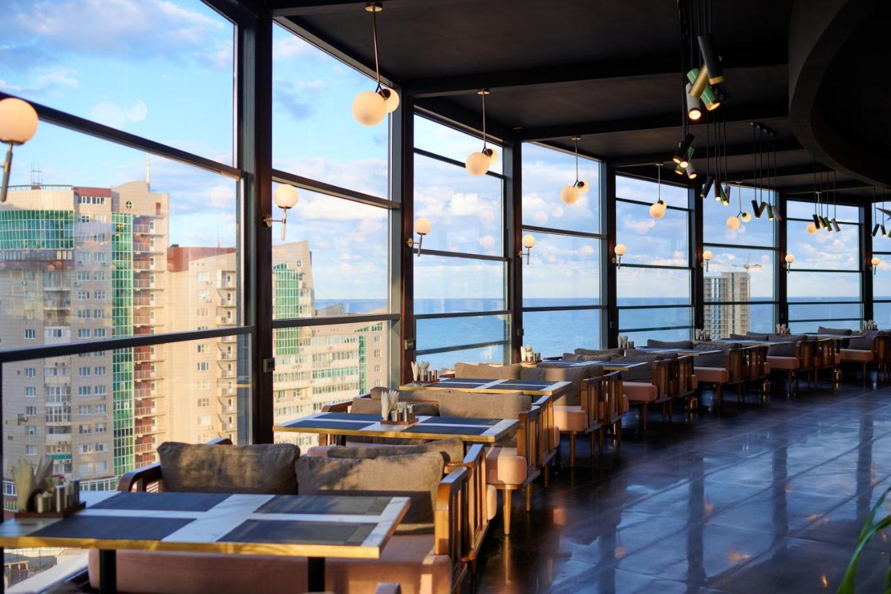 Grand Hotel Victory Aktau  Exterior photo Skyline Bar